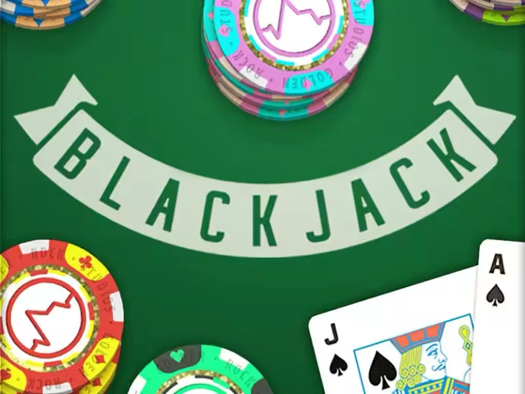 Blackjack themed table game featuring an Ace of spades and Jack of spades pair surrounded by poker chips.